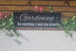 Gardening. So excited i wet my plants Wooden Sign